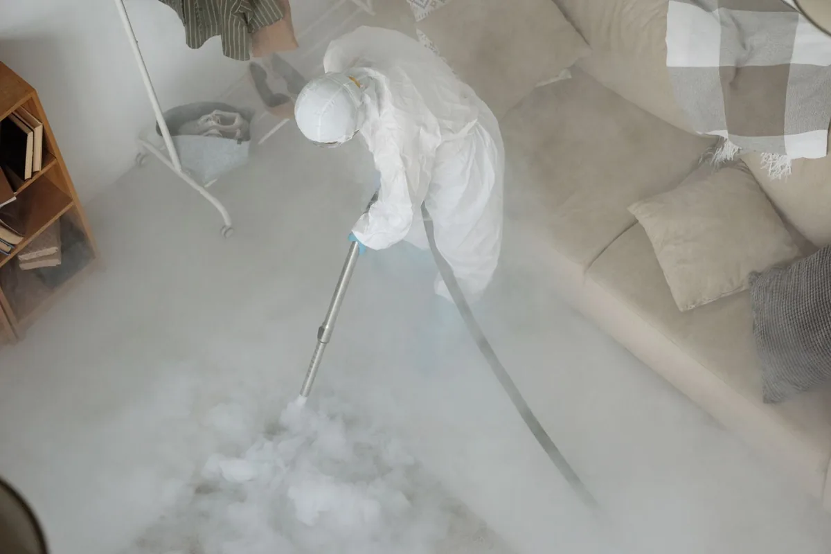 Biohazard cleanup technician in protective equipment, Norwood, New York, NY